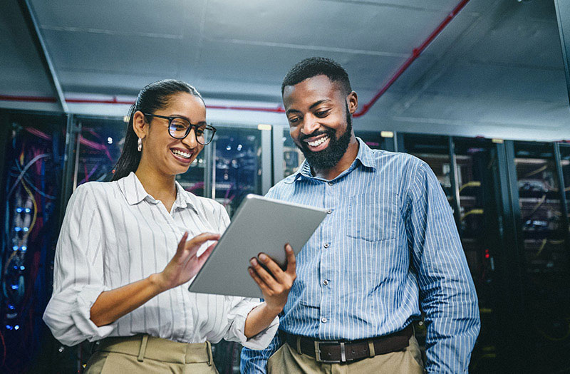 Optimise performance, multiply savings. Business professional using tablet