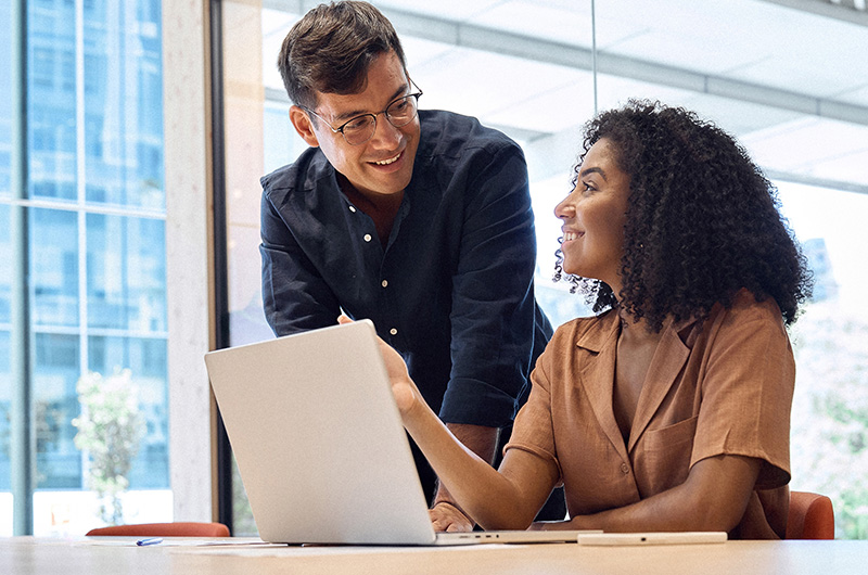 Take Control of Software, SaaS, AI, and Cloud Costs. Two businesswomen working on a tablet