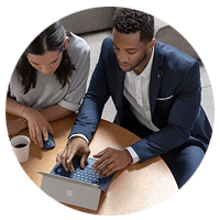 Employees working on a laptop