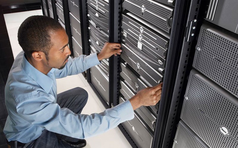 Man looking at servers