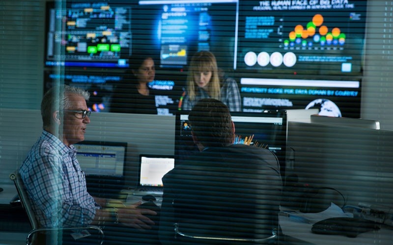 Dell employees managing storage data