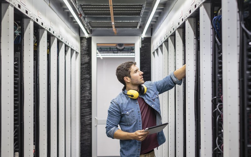 Man working in server room
