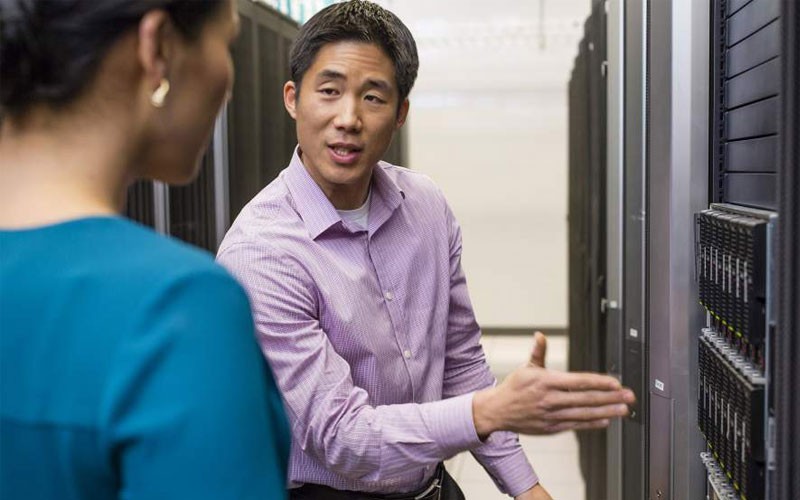 Man and woman in IT server room