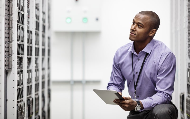 IT employee working in HPE server room