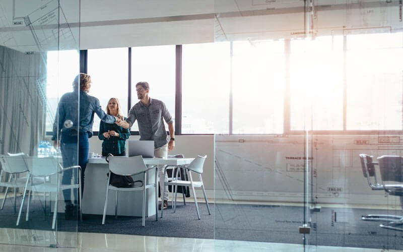 Group of people meeting in a modern business room